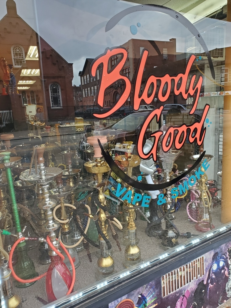 Bloody Good Vape and Smoke Logo with hookahs in the background